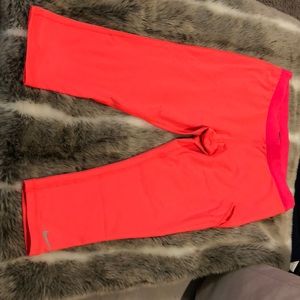 Coral Nike workout capris